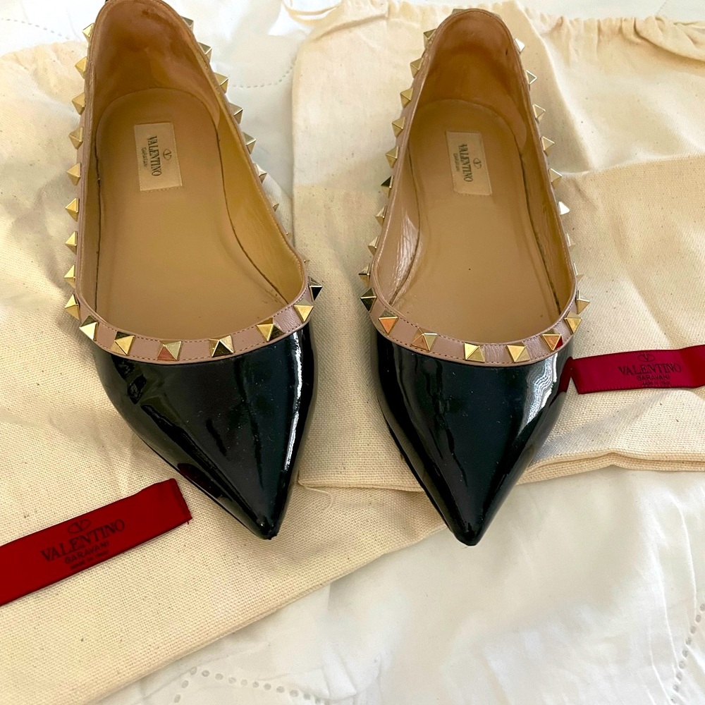 Valentino Rockstud Black Patent flat with taupe trim and gold rock studs.